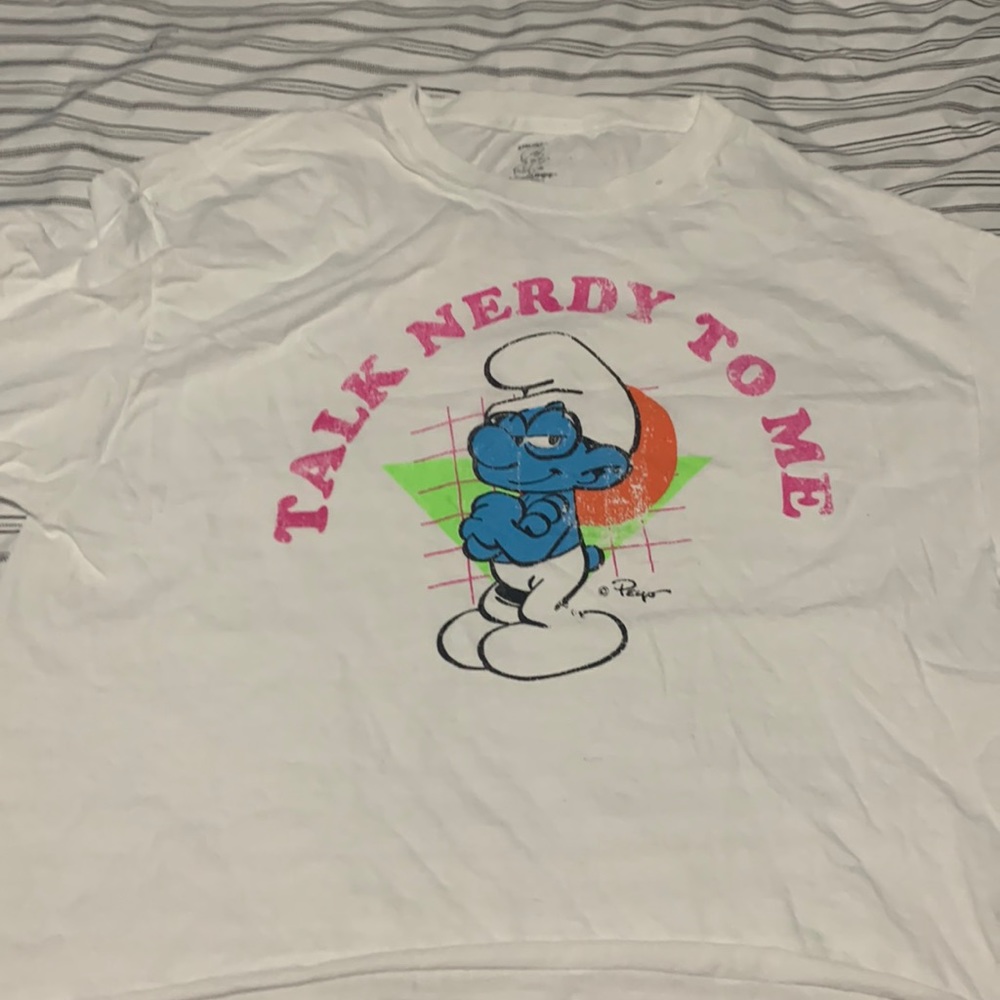 A white shirt with a Smurf design size:L/G